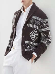 Detailed view of men's brown knit cardigan with white geometric jacquard pattern