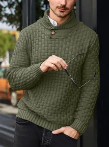 Close-up of olive green knitted sweater showing unique basket weave texture and collar