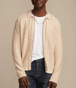 Detail view of men's long-sleeve knit polo cardigan with pointelle vertical stripes