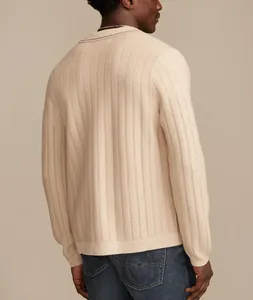 Back view of a men's cream long-sleeved knit polo with vertical openwork stripes