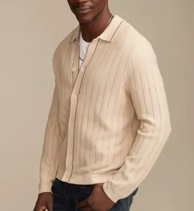 Detailed view of men's beige pointelle knit polo cardigan with vertical ribbed texture