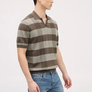 Detailed macro view showing the texture of a men's knitted V-neck checkered Polo shirt