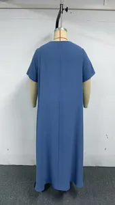 Detailed rear view of a loose blue plus size maxi dress displayed on a mannequin stand