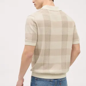 Men's cream hollow knit short sleeve polo shirt featuring a textured stripe pattern, back view
