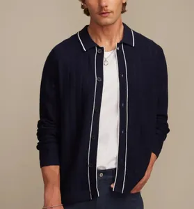 Premium men's navy blue pointelle knit polo cardigan featuring contrast white trim detail
