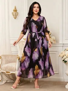 Elegant plus size floral print mesh midi dress featuring V-neck and waist tie belt