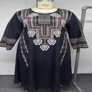 Detail view of navy blue plus size long sleeve dress with retro ethnic patterns
