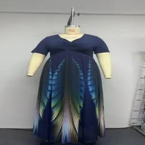 Detailed view of plus size V-neck short sleeve dress with gradient feather print mesh skirt