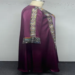 Purple long-sleeved caftan dress with ethnic embroidery on sleeves and front detail.