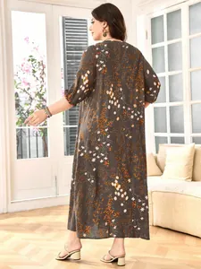 Detailed back view of a plus-size vintage floral print long maxi dress with lantern sleeves
