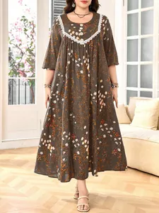 Full view of vintage floral plus size maxi dress with lace detail and lantern sleeves
