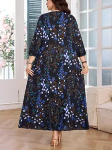 Back view of a plus size vintage floral long dress with elegant lantern sleeves.