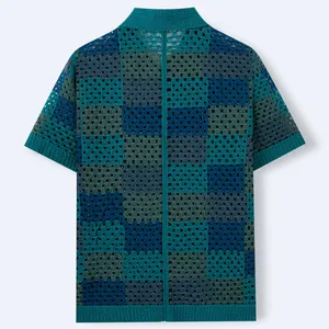 Back view of a checkerboard crochet hollow-out knit shirt in blue and green shades.