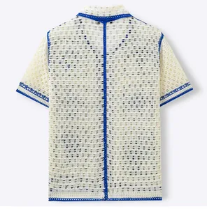 Back view of men's resort-style crochet knit polo shirt with blue contrast trim and hollow patterns