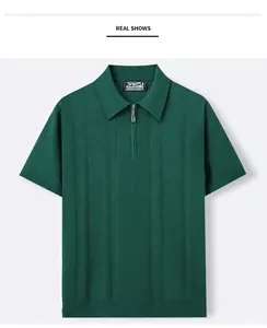 Detailed view of a men's emerald green quarter-zip short sleeve knitted Polo shirt.