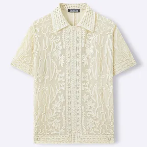 Heavy embroidery hollow knit polo shirt with floral jacquard relief in cream cotton