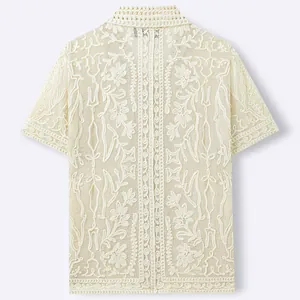 Premium men's short sleeve off-white knit polo shirt featuring intricate floral crochet detail