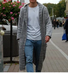 Detail of men's long grey hooded knit cardigan with vintage loose fit sweater style