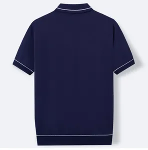 Rear view of a premium men's navy blue short sleeve knit polo shirt with white tipping details