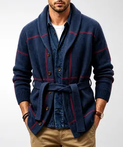 Macro detail of men's navy blue knitted cardigan featuring red grid patterns and belt.