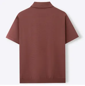 Back view of a premium men's short-sleeved knit polo shirt in reddish-brown terracotta