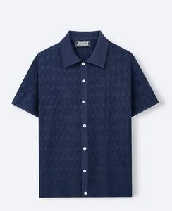 Detailed view of navy blue hollow-out knit polo shirt for men with button closure