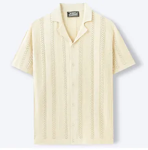 Close-up of men's cream Cuban collar knit shirt with wheat ear jacquard detail