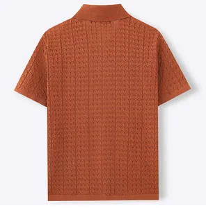 Detailed back view of a men's terracotta knit polo shirt with intricate vertical patterns