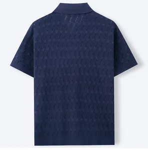 Detailed back view of navy blue men's knitted polo shirt with leaf jacquard pattern