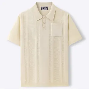 Macro view of cream-colored short-sleeve knit polo shirt featuring vertical ribbing