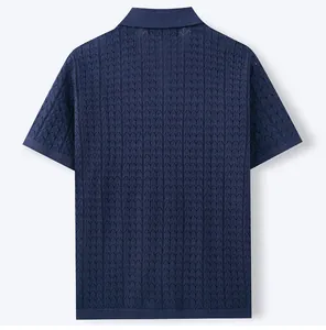 Back view of a navy blue short-sleeve knitted polo shirt with textured jacquard pattern