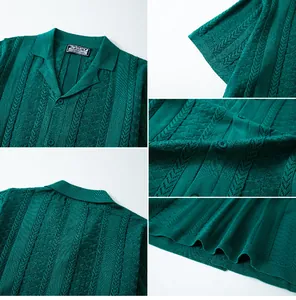 Detailed close-up of dark green knitted polo shirt with wheat ear jacquard texture