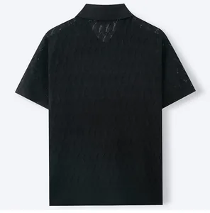 Back view of a black men's short sleeve knit polo shirt featuring a detailed jacquard pattern
