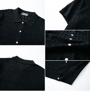 Close-up of black men's knit polo shirt with intricate jacquard texture and buttons
