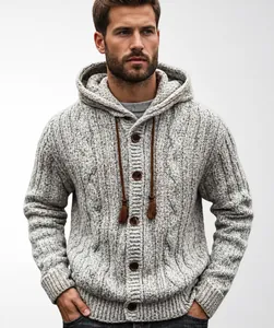 Detailed view of men's cable knit hooded cardigan sweater with tassel drawstrings.
