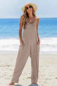 Women's casual loose jumpsuit with pockets in a beach summer setting