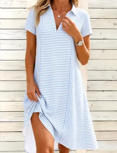 Detail view of a blue and white striped short sleeve V-neck summer beach mini dress.