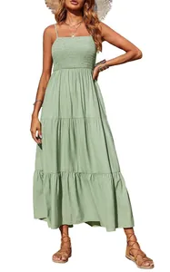 Elegante mintgroene maxi-jurk met spaghettibandjes en gesmokt lijfje voor dames