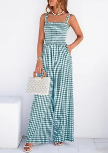 Summer retro plaid strappy jumpsuit with wide-leg design and smocked bodice detail.