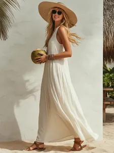 Elegant white sleeveless maxi dress for women beach vacation and summer resort styling