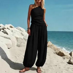Chique zwarte one-shoulder top en harembroek met hoge taille set voor casual strandkleding