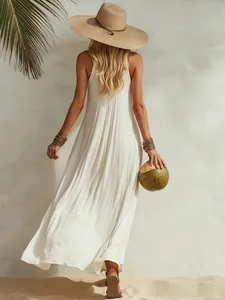 Detailed back view of an elegant white pleated sleeveless maxi dress for summer vacations