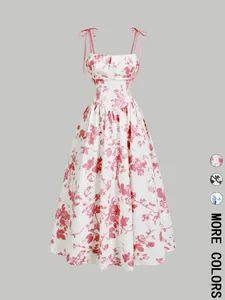 Vista frontal de un vestido playero con estampado floral y más opciones de colores