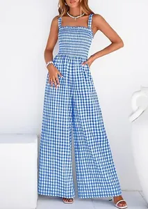 Detailed view of the smocked bodice and blue gingham pattern on a wide leg jumpsuit