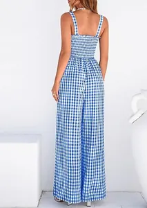 Back view of blue gingham sleeveless jumpsuit with a smocked bodice and wide legs.