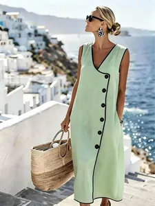 Elegant mint green summer vacation midi dress with contrast black piping and decorative buttons