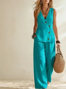 Élégant ensemble d'été turquoise avec un gilet boutonné et un pantalon à jambes larges