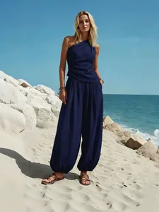 Marineblauwe set van top met één schouder en wijde pofbroek voor dames in de zomer