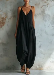 Detailed view of the black deep V-neck loose harem jumpsuit for summer vacation