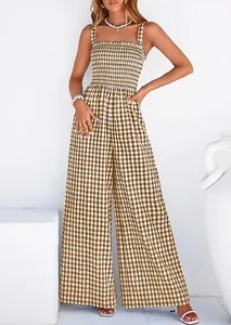 Detailed view of women's brown gingham wide leg jumpsuit with smocked bodice design